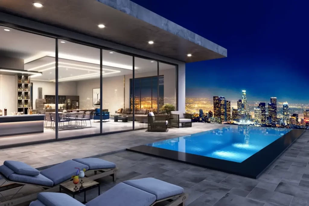 Large aluminium sliding glass patio doors opening onto a outdoor pool deck